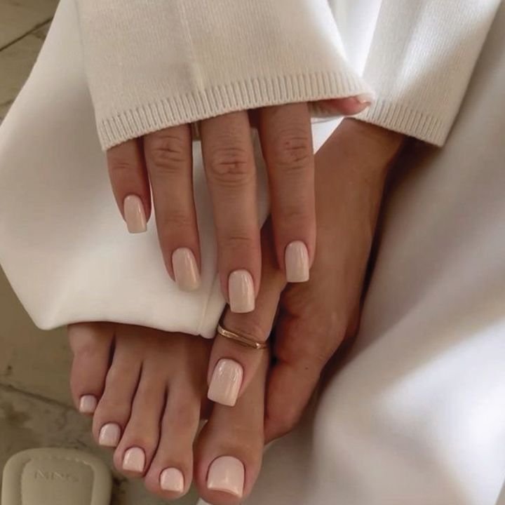 Soft nude gel nails on hands and toes